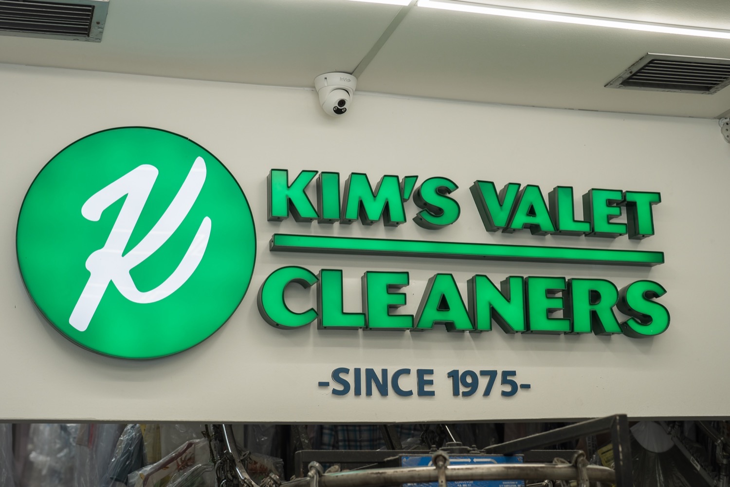 Kim's Valet Cleaners neon storefront sign — Since 1975